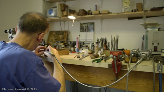 Musical box restorer working at his bench